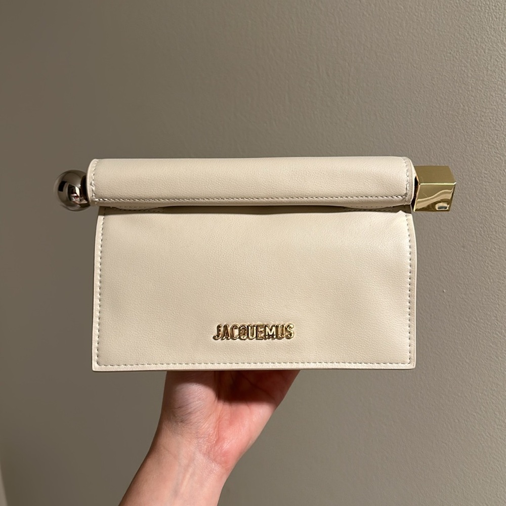 Jacquemus Cream Clutch with Gold Accent